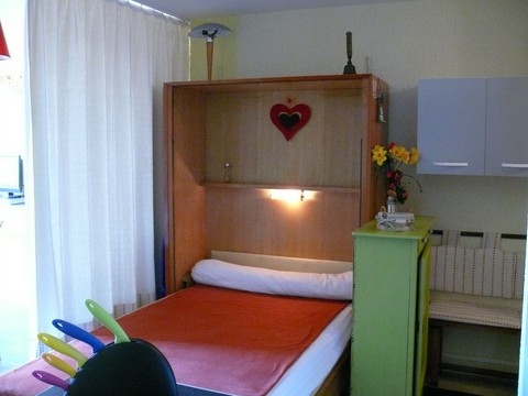 Studio 35 m² Super Besse - Lit armoire studio.